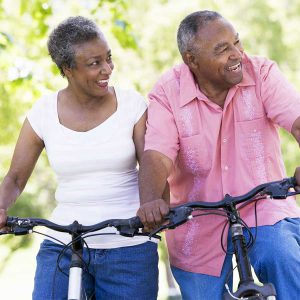 Older/mature couple cycling