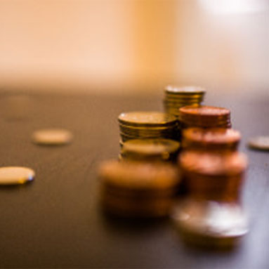 Coins piled on a table 