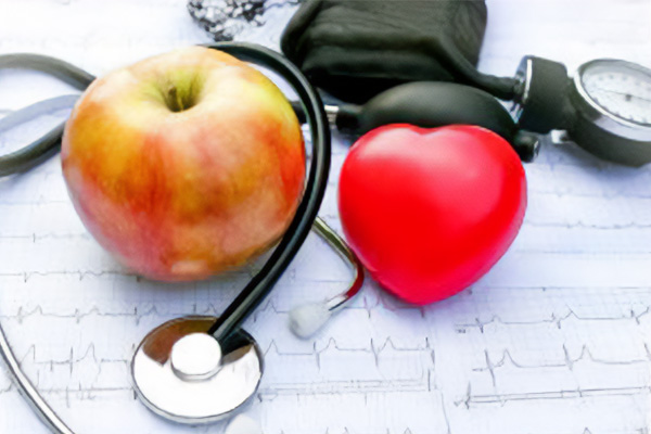 Image of Stethescope and apple Image of Stethescope and apple