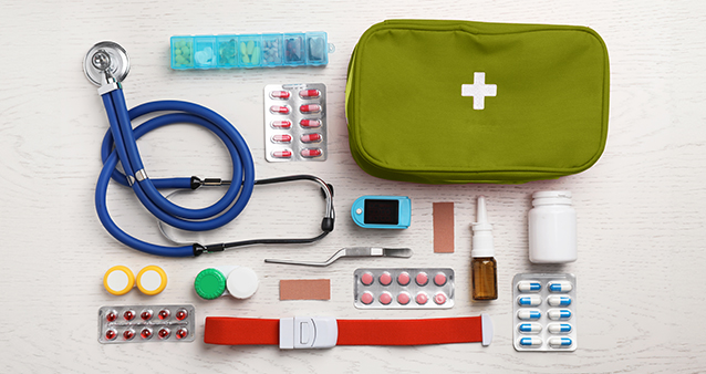 Medical kit flatlay comprised of various first aid items