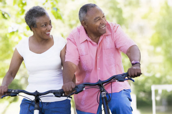 Older/mature couple cycling