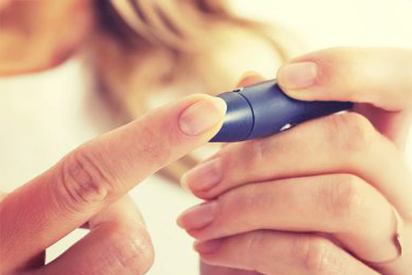 Woman testing diabetes injection 